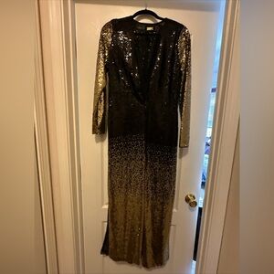 Sequined black and gold long sleeve vest with hook front tie